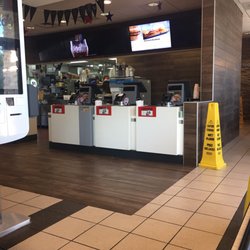 Front counter. The employee taking your order is very friendly and constantly cleaning when not taking orders
