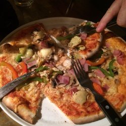 Porto Fino - This is a popular local joint so be prepared to wait.  It will be well worth it.