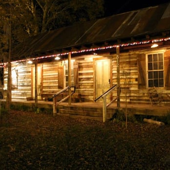 Swamp Shack Daiquiris - a log cabin at night - Bars Near Me - Port Allen, Louisiana