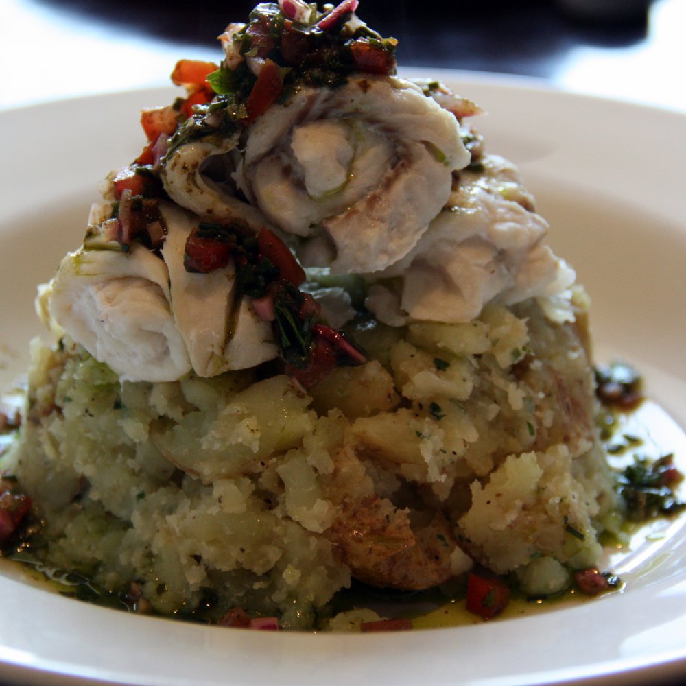 Helgi's - Megrim Vierge: steamed megrim fillets on crushed new tatties, with herby, citrus sauce vierge. - British Near Me - Kirkwall, ORK