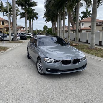 TPT FOREIGNS - BMW 320i gloss nardo grey wrap with black roof and black mirrors. - Powder Coating Near Me - Doral, Florida