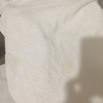 Gardena Terrace Inn - YELLOW STAINS ON THE TOWEL!!! That is disgusting. - Hotels Near Me - Gardena, California