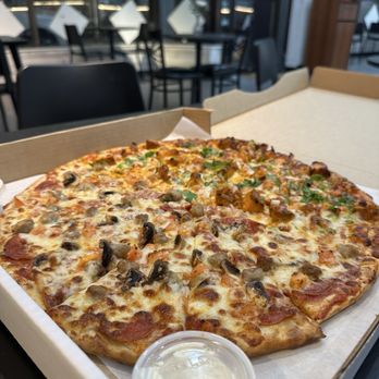 Bollywood 360 - Butter chicken and extreme combo pizza (half/half) - Indian Near Me - Seattle, Washington Bollywood 360 - Butter chicken and extreme combo pizza (half/half) - Indian Near Me - Seattle, Washington