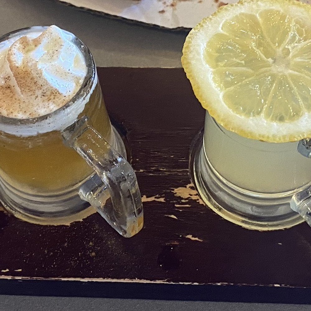This was their vodka flight which includes chocolate drop shot, apple pie shot, lemon drop shot, and pineapple upside down cake shot. This was their vodka flight which includes chocolate drop shot, apple pie shot, lemon drop shot, and pineapple upside down cake shot.