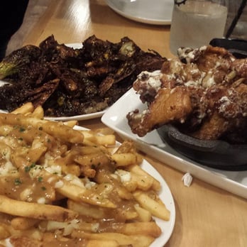 Capital Craft - The poutines are in front but the real star is the Brussel Sprouts in the back! - Pizza Near Me - Green Brook, New Jersey Capital Craft - The poutines are in front but the real star is the Brussel Sprouts in the back! - Pizza Near Me - Green Brook, New Jersey