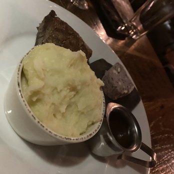 Hickory & Ash - Filet Mignon with Yukon gold mashed, blue cheese butter, and house-made steak sauce - Steakhouses Near Me - Broomfield, Colorado Hickory & Ash - Filet Mignon with Yukon gold mashed, blue cheese butter, and house-made steak sauce - Steakhouses Near Me - Broomfield, Colorado