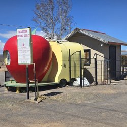 Master Food Truck - Cute little food truck stall with parking and seating in the background