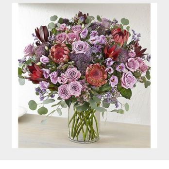 Conroy's Flowers Bakersfield - What was pictured. Full and bursting with flowers.  Tons of roses and other flowers. Beautiful arrangement. - Florists Near Me - Bakersfield, California