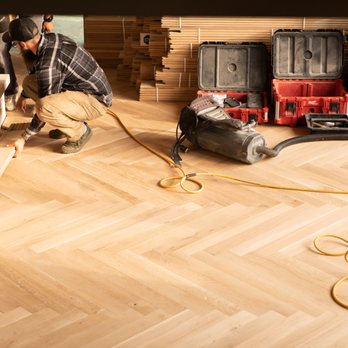 Schmidt Custom Floors - a man working on a hard wood floor - Flooring Near Me - Loveland, Colorado Schmidt Custom Floors - a man working on a hard wood floor - Flooring Near Me - Loveland, Colorado