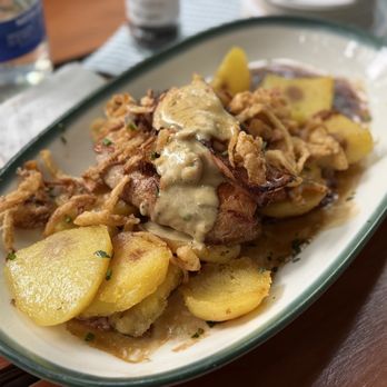 Augustiner-Keller - Bacon on top of pork with peppercorns sauce. Delicious! - Bavarian Near Me - Munich, BY Augustiner-Keller - Bacon on top of pork with peppercorns sauce. Delicious! - Bavarian Near Me - Munich, BY