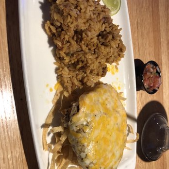 Applebee's Grill + Bar - fiesta chicken on crunchy tortilla chips with heat-in-the-microwave rice. I'm not certain about that but it was not desirable. - American Near Me - Athens, Texas