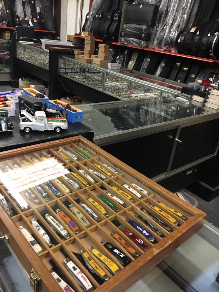 Tonys Knives & Collectibles Logo