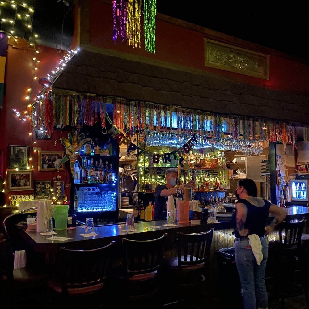 Blind Willie's - a woman sitting at a bar - Jazz & Blues Near Me - Atlanta, Georgia