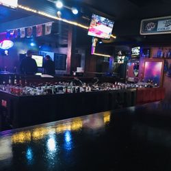 Roadhouse Bar & Grill - Inside the bar, dark smokey, and cheap drinks. Has pinball and a few video games