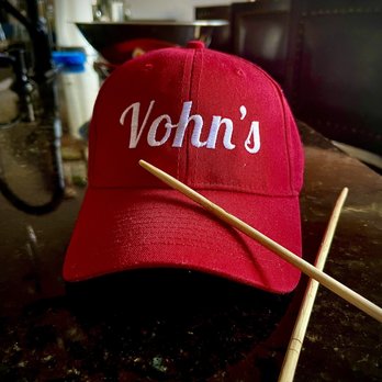 Vohn's Restaurant - a red hat and two wooden sticks - Vietnamese Near Me - Bellingham, Massachusetts