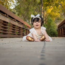Cynthia Bullard Photography - Baby sitting on bridge, outdoor session, Camarillo, CA