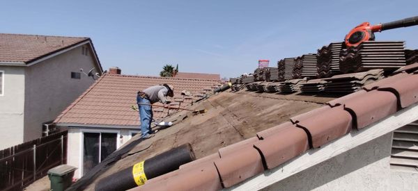 Top Of The Line Roofing Logo