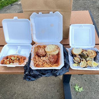 Southern Craft - three take out boxes of food on a picnic table - Cajun/Creole Near Me - Parkersburg, West Virginia