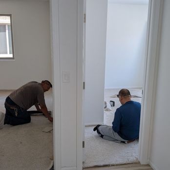 DEL Flooring - They care, look at the booties and Eddie Sr. Even wore new shoes to avoid dirtying the carpet - Flooring Near Me