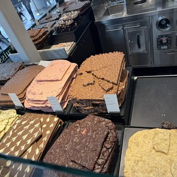 Läderach - Slabs of chocolate the store attendants called FrischSchoggi - Chocolatiers & Shops Near Me - San Diego, California Läderach - Slabs of chocolate the store attendants called FrischSchoggi - Chocolatiers & Shops Near Me - San Diego, California