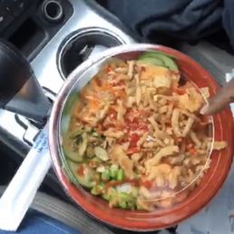 a bowl of noodles and vegetables a bowl of noodles and vegetables