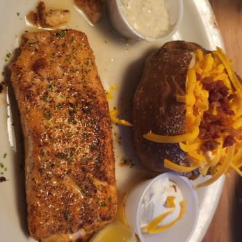 Texas Roadhouse - 6oz. Sirloin and grilled salmon with loaded baked potato. - Barbeque Near Me - Woodbridge, Virginia Texas Roadhouse - 6oz. Sirloin and grilled salmon with loaded baked potato. - Barbeque Near Me - Woodbridge, Virginia