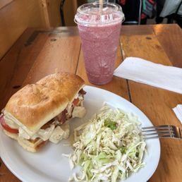 Chicken Chipotle Sandwich and pomegranate drink. Chicken Chipotle Sandwich and pomegranate drink.