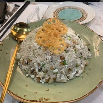 Supreme Dumplings - Wild Mushroom Fried Rice with Lotus Root chips - Shanghainese Near Me - Bellevue, Washington Supreme Dumplings - Wild Mushroom Fried Rice with Lotus Root chips - Shanghainese Near Me - Bellevue, Washington