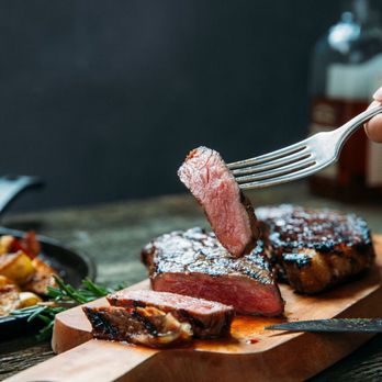 Meat the Butchers - a piece of steak being served with a fork - Butcher Near Me - Vernon, California Meat the Butchers - a piece of steak being served with a fork - Butcher Near Me - Vernon, California