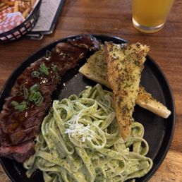 September special: New York Strip and Alfredo Pesto fettuccine. September special: New York Strip and Alfredo Pesto fettuccine.