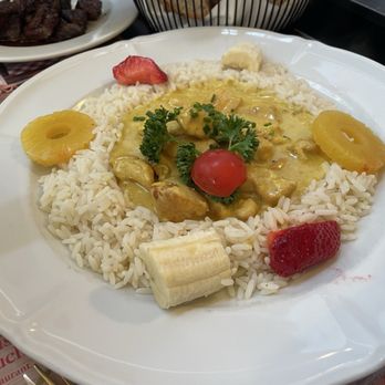 Swiss Chuchi - Curry ragout with fruit - Fondue Near Me - Zürich, ZH Swiss Chuchi - Curry ragout with fruit - Fondue Near Me - Zürich, ZH