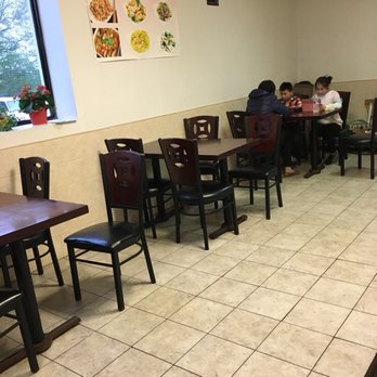 China Wok - people sitting at tables in a restaurant - Chinese Near Me - Wolcott, Connecticut