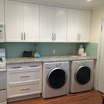Handy Home Improvement - New higher kitchen cabinets = no more back pain while cooking and an undercounter washer and dryer. Lots of upper storage. - General Contractors Near Me - Huntington Beach, California
