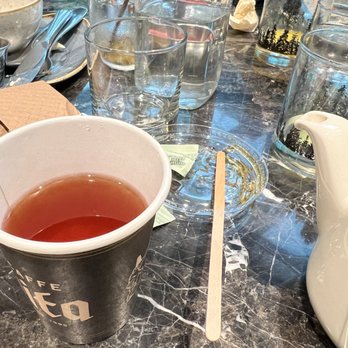 Currant Bistro - a cup of tea on a table - New American Near Me - Seattle, Washington Currant Bistro - a cup of tea on a table - New American Near Me - Seattle, Washington