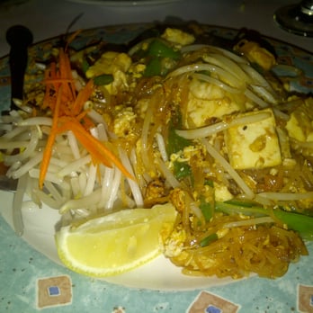 Coconut Bay - Papaya Pok Pok Salad: Shredded green papaya mixed with green beans, Chili, carrots, tomatoes and ground peanuts - Thai Near Me - Burlingame, California