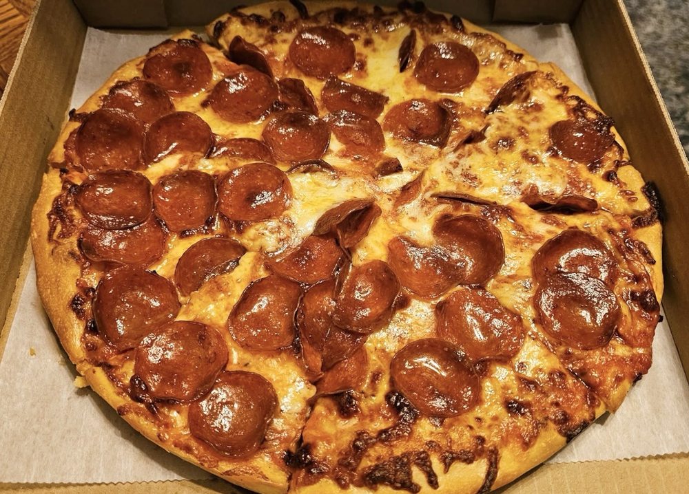 Pat's Fireside Pizza Logo