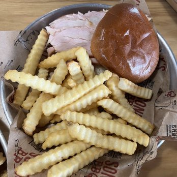 Sonny's BBQ - Smoked turkey sandwich on a bun with fries - Barbeque Near Me - Orlando, Florida Sonny's BBQ - Smoked turkey sandwich on a bun with fries - Barbeque Near Me - Orlando, Florida