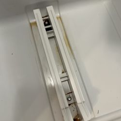 Tippy Toe’s Cleaning - Refrigerator drawer fixture