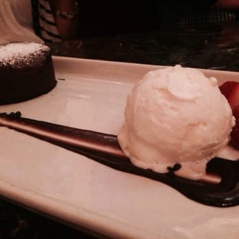 Grand Lux Cafe - Chocolate molten lava cake is to die for. - American Near Me - Paramus, New Jersey Grand Lux Cafe - Chocolate molten lava cake is to die for. - American Near Me - Paramus, New Jersey