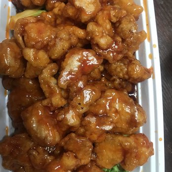 Little China - Orange chicken, chef specialty. Comes with white rice (not shown). Upcharge if you want fried rice or lo mein. - Chinese Near Me - Jacksonville, Florida Little China - Orange chicken, chef specialty. Comes with white rice (not shown). Upcharge if you want fried rice or lo mein. - Chinese Near Me - Jacksonville, Florida