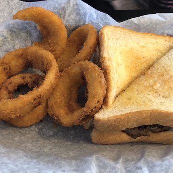 Happy Daze - Patty melt with awesomely crispy onion rings. - American Near Me - Nesbit, Mississippi