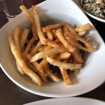Devil's Advocate - French fries (there were more.. this is after snacking on them for a bit) - Bars Near Me - Minneapolis, Minnesota