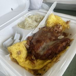 Omelette with corn beef hash and grits Omelette with corn beef hash and grits