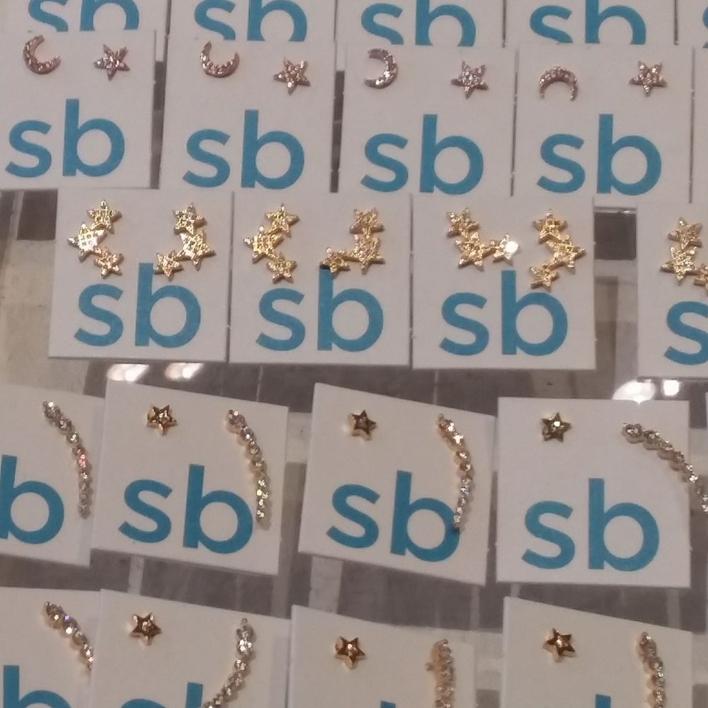 Sunshine And Bluebirds - Their own branded jewelry including mid-ear studs and complimentary but not matching earrings. - Accessories Near Me - Buffalo, New York Sunshine And Bluebirds - Their own branded jewelry including mid-ear studs and complimentary but not matching earrings. - Accessories Near Me - Buffalo, New York