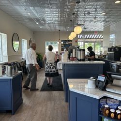 Seven Stars Bakery - Coffee bar area and area with milks/sugars/add-ins and condiments