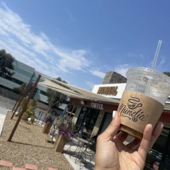 Mundial Coffee - Front of the building and my half drank brown sugar oat milk latte - Coffee & Tea Near Me - Riverside, California Mundial Coffee - Front of the building and my half drank brown sugar oat milk latte - Coffee & Tea Near Me - Riverside, California