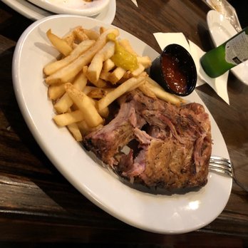 Dogwood Bar & Grill - The mustard is an addition by Bill who could not wait 2 seconds for me to take a picture before he dove into the half rack of ribs. - New American Near Me - Durham, North Carolina