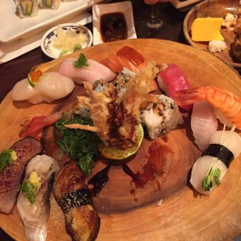 Sushi Prince - King sushi platter (some pieces already eaten) - Japanese Near Me - Fairfax, Virginia