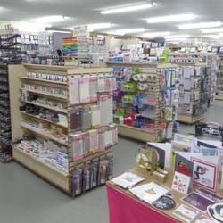Samuel Taylor - Front of the store, with a table of card samples, and behind it racks & racks of wonderful papercrafting supplies to browse through.