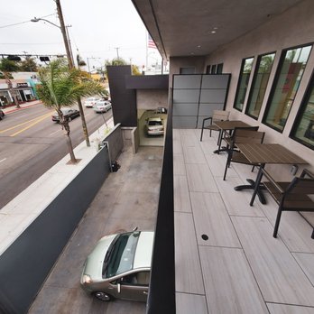 Lexology - Balcony overlooking wash bay and Aviation Blvd - Auto Repair Near Me - Hermosa Beach, California